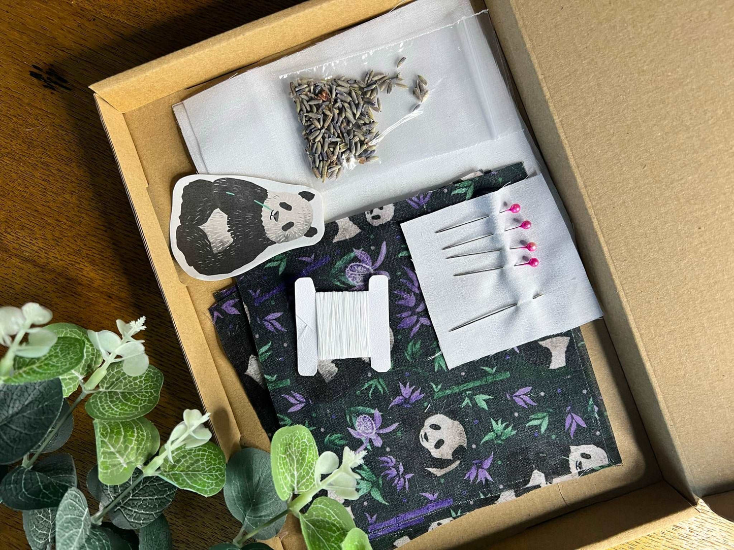 DIY Kit for making panda-themed hand warmers.