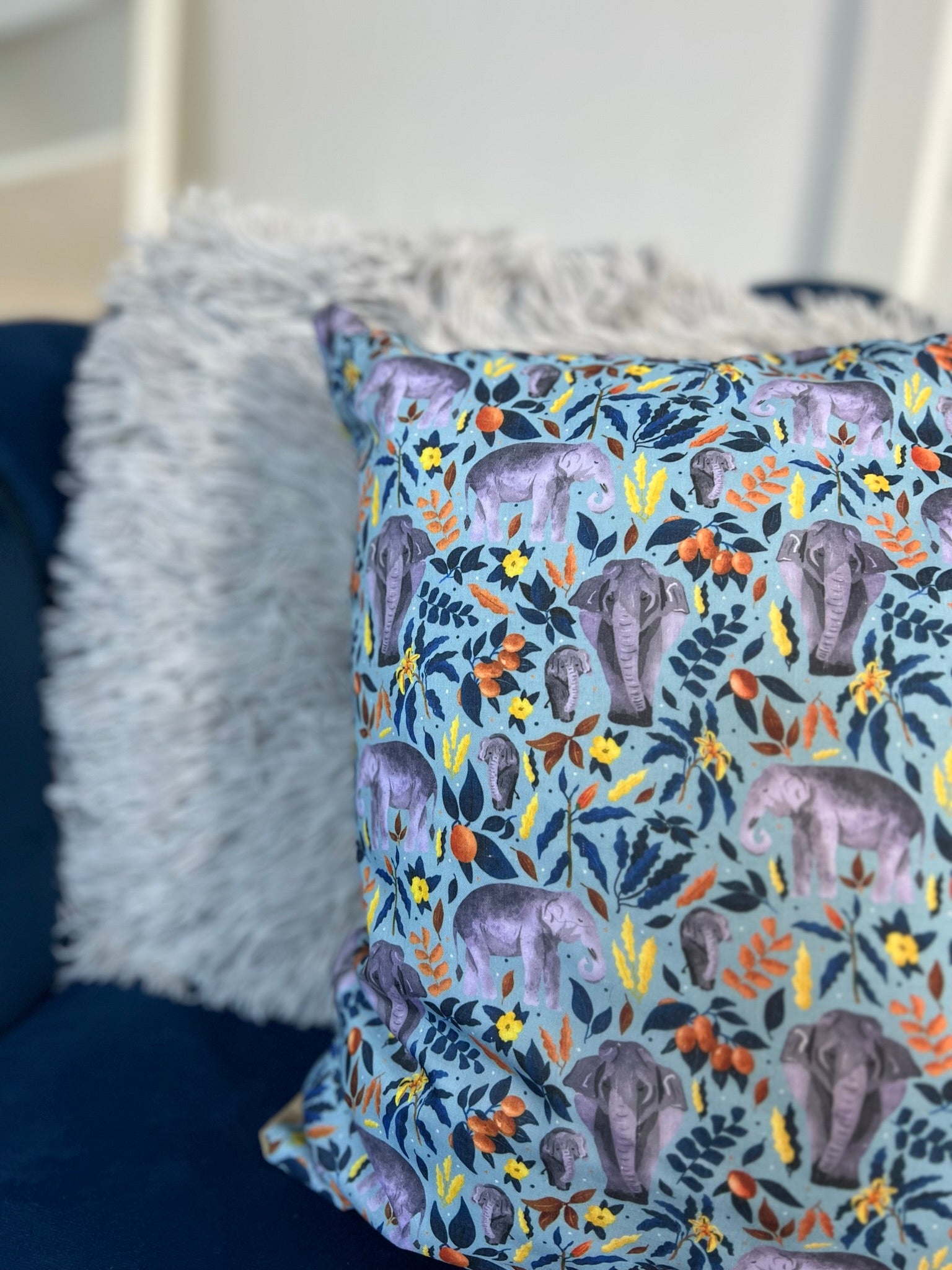 closeup of the corner of the elephant decorative cushion, a perfect gift for an elephant lover