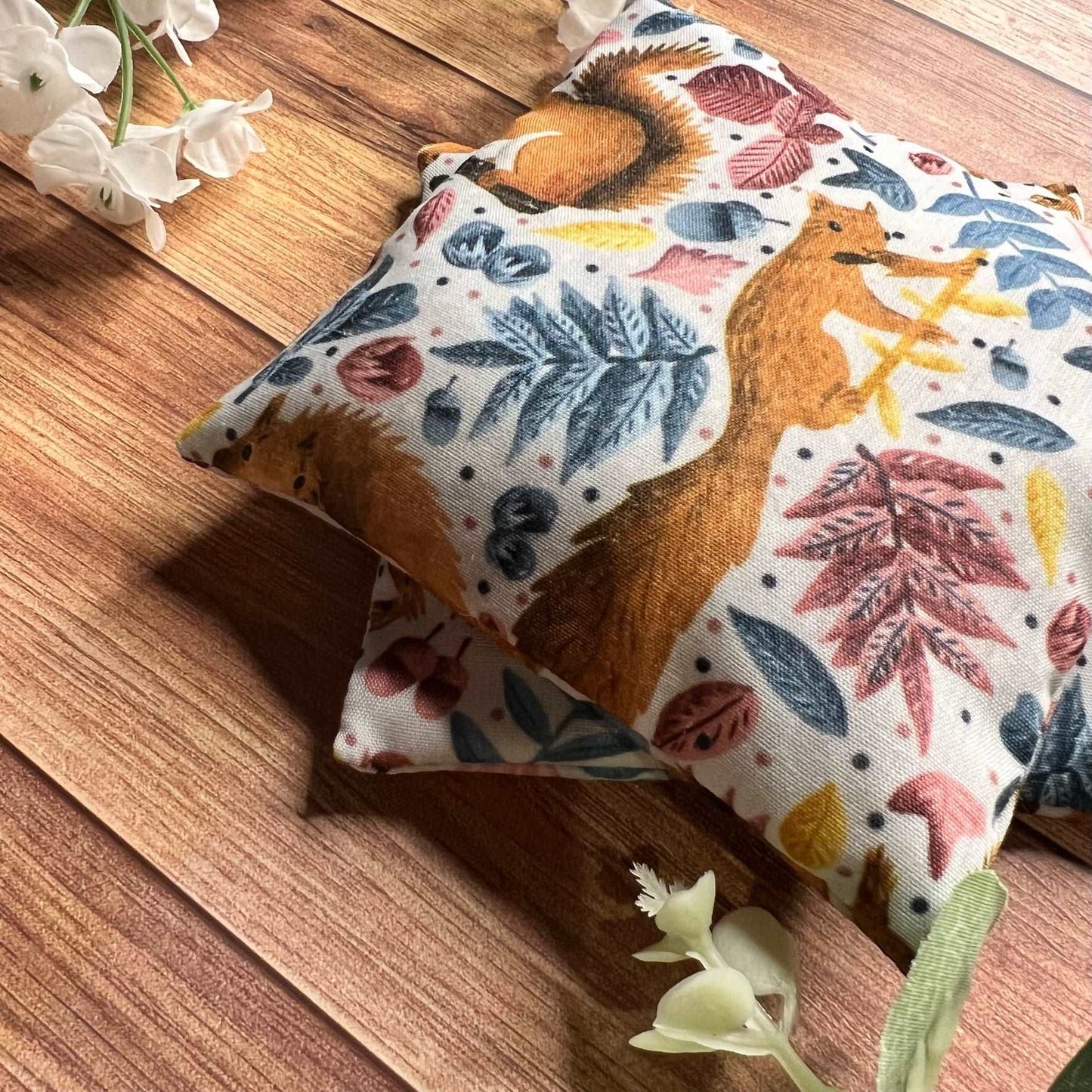 DIY Hand Warmer Kit featuring adorable red squirrel designs.