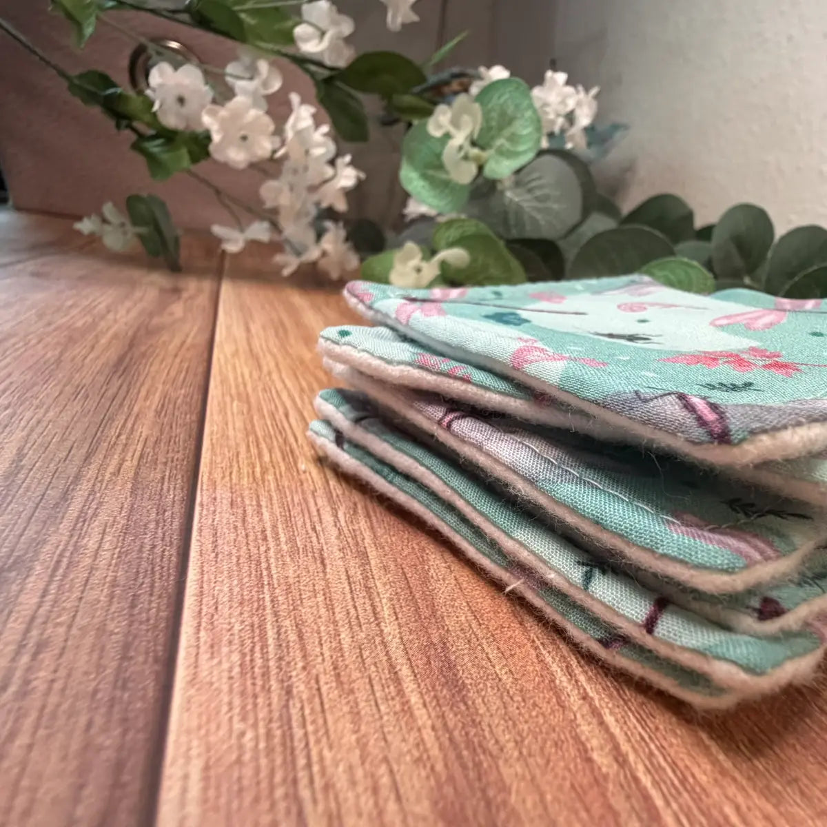 Lightly padded dragonfly cleansing pads designed for regular washing and reuse.