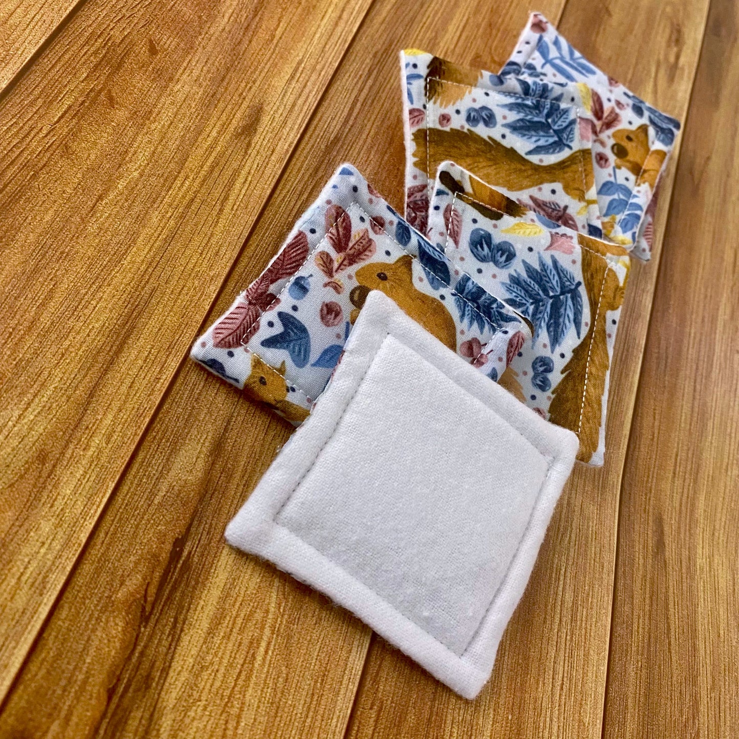 Adorable red squirrel reusable cotton pads, ideal for eco-conscious skincare routines.