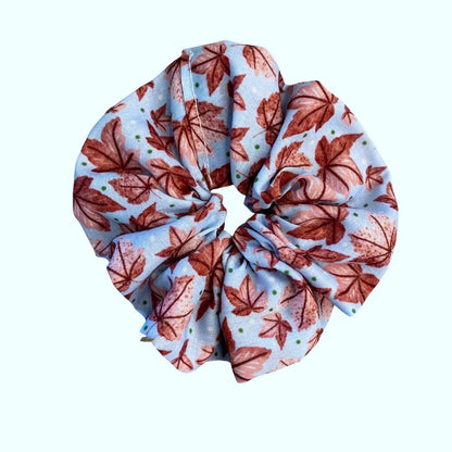 pink leaves on blue background pattern on a scrunchie