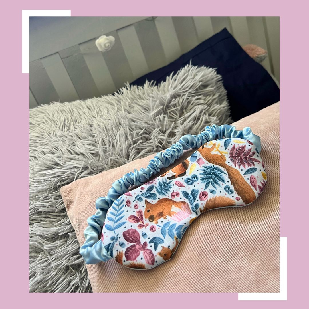 red squirrel gifts for her, a sleepmask with the red squirrel pattern design on it