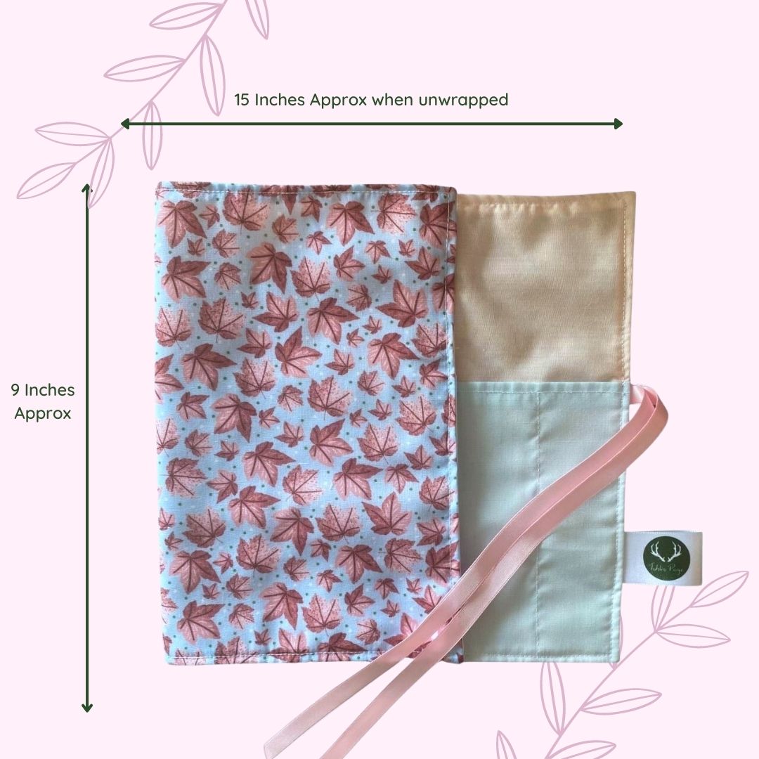 Pink Leafy Brush Wrap that opens flat to safely store paintbrushes by Tahlia Paige
