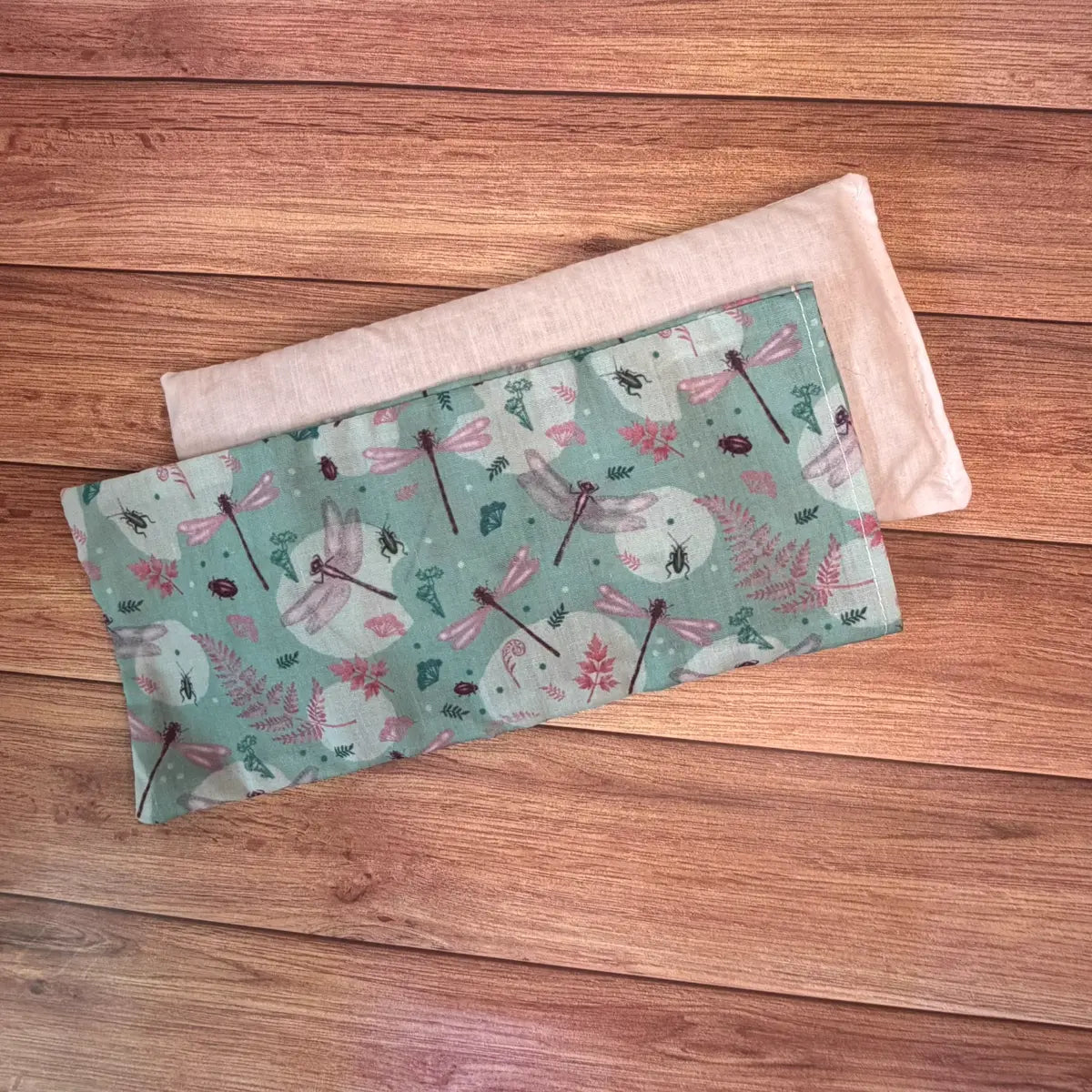 Dragonfly patterned hot wheat bag filled with natural wheat and lavender.

