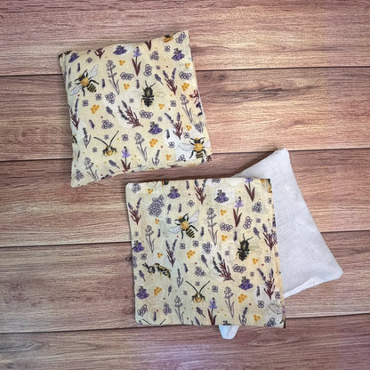 Handmade bee hand warmers featuring original Tahlia Paige illustrated bee artwork.
