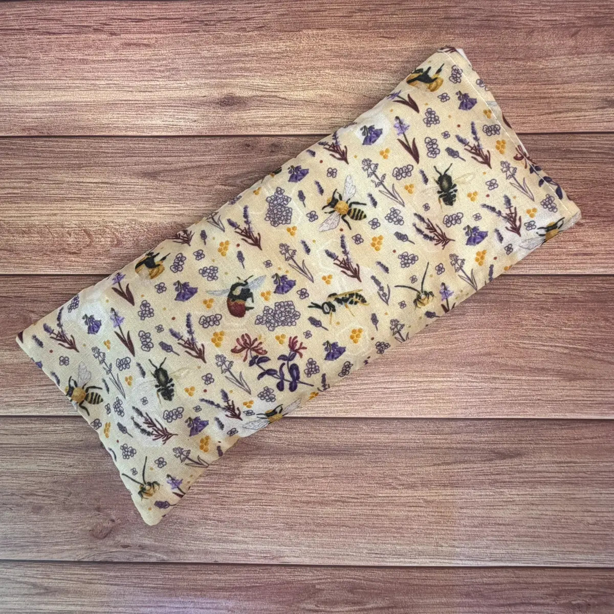 Handmade bee microwave wheat bag featuring original Tahlia Paige bee illustrations.
