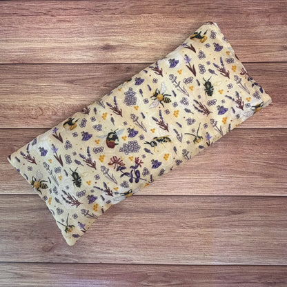Handmade bee microwave wheat bag featuring original Tahlia Paige bee illustrations.
