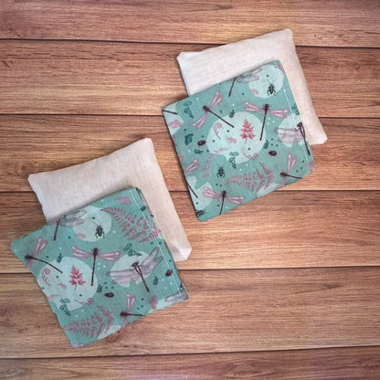 Handmade dragonfly reusable hand warmers featuring original Tahlia Paige insect illustrations.
