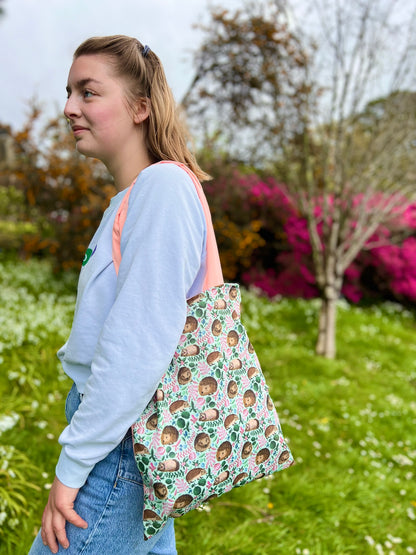 Handcrafted tote bag with cute hedgehog design, suitable for university use, folding shopping, and wildlife lover gift ideas