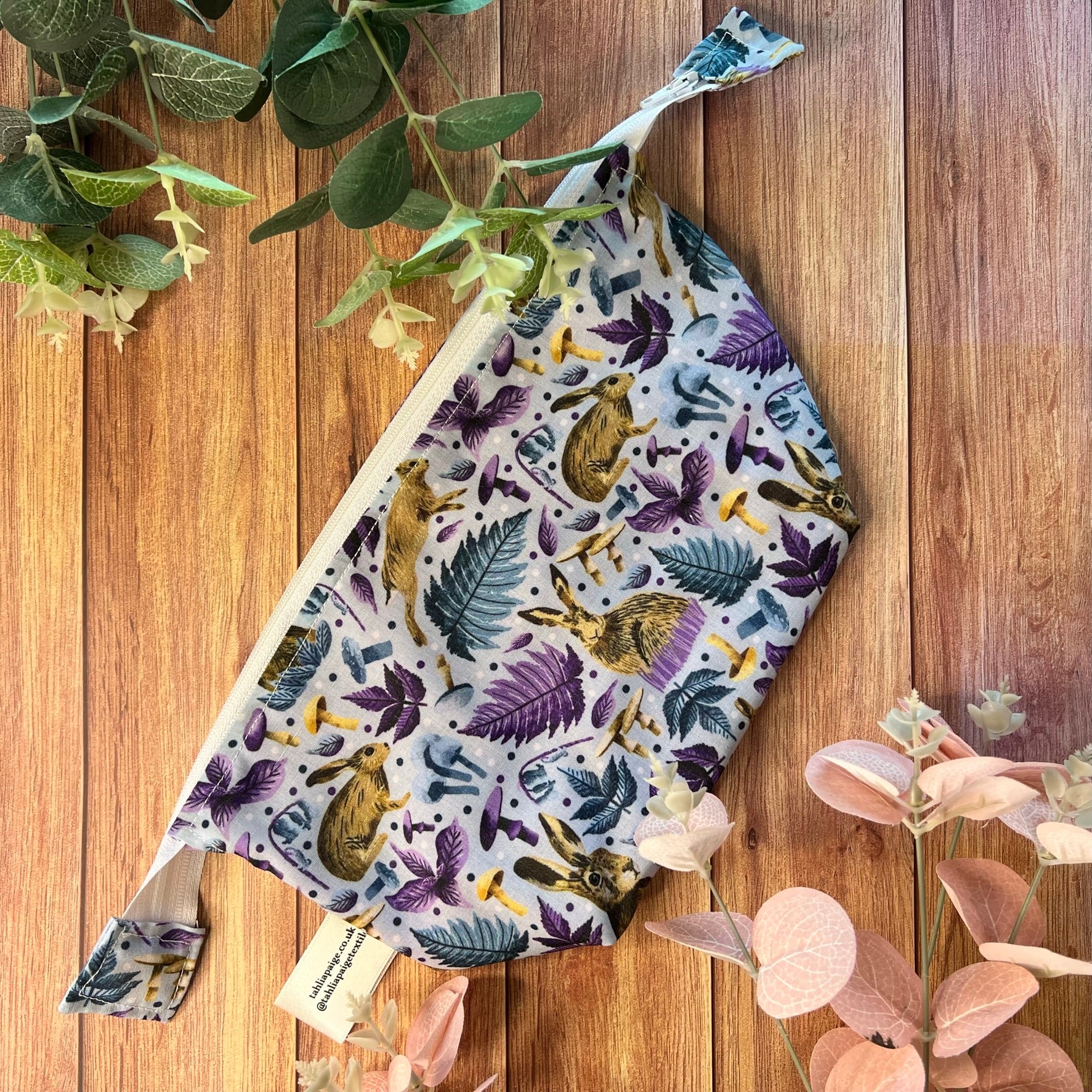A beautifully designed hare makeup bag, perfect for hare gifts in the UK and unusual wildlife gifts.