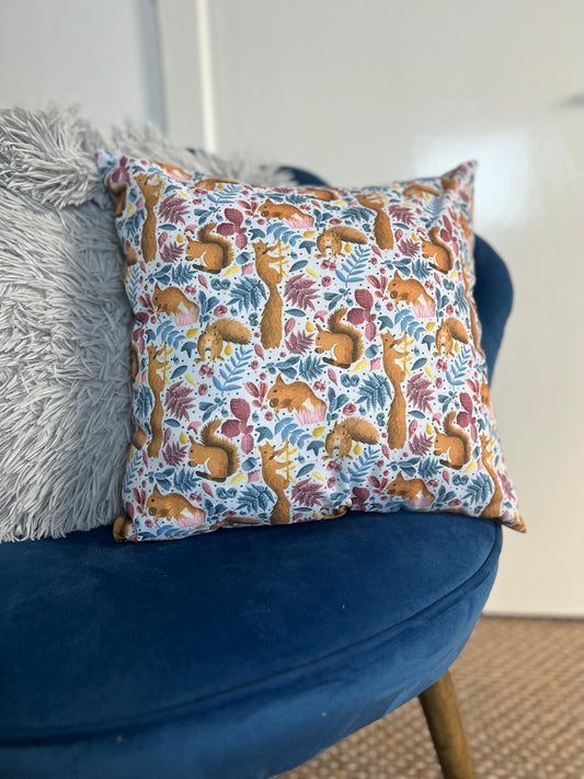 Shop squirrel gift ideas with our red squirrel decorative cushion for a sofa. Ideal for someone who loves squirrels, shop our wildlife gifts today.