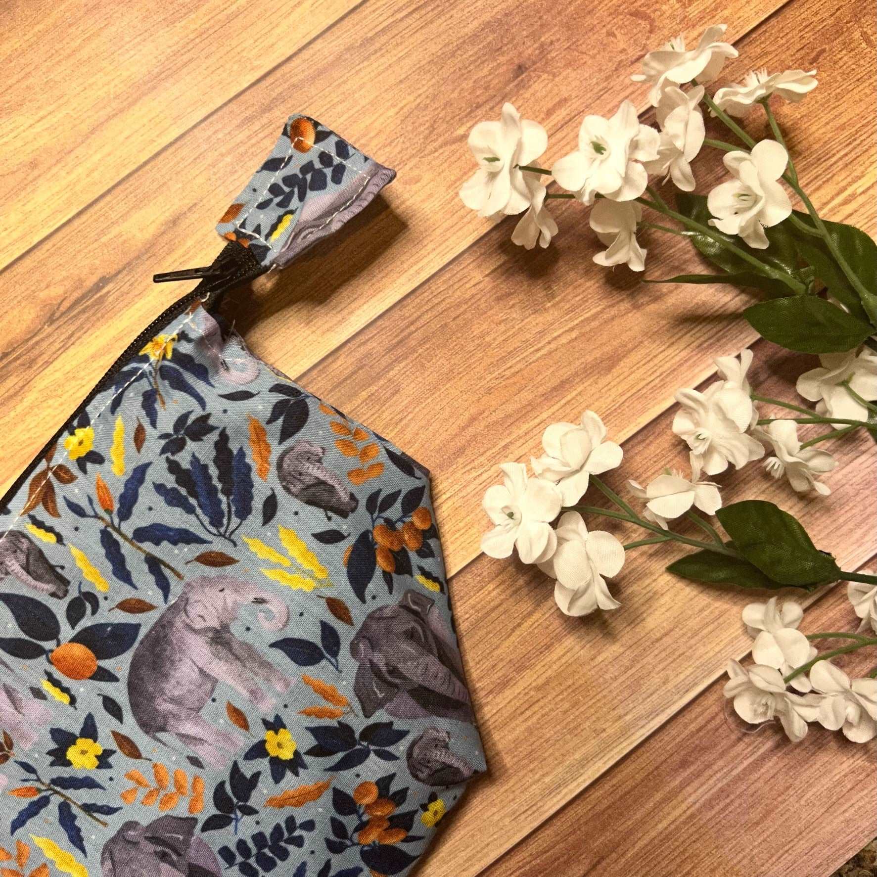 Compact and stylish elephant makeup bag.