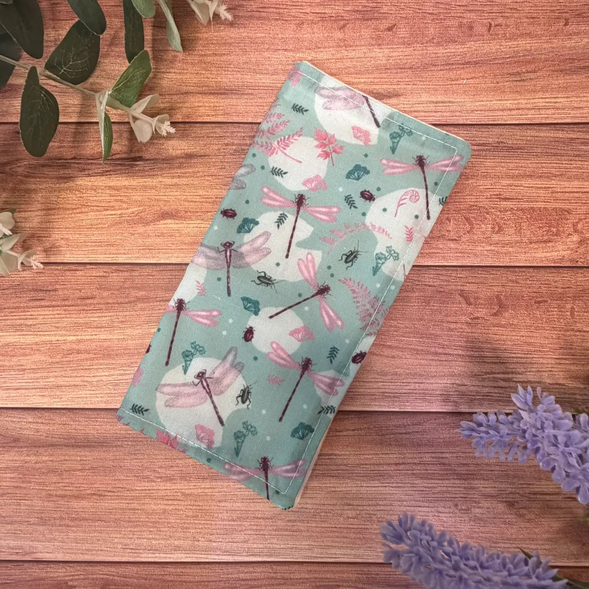 Reusable face cloth with a dragonfly patterned avio cotton backing and brushed cotton surface.
