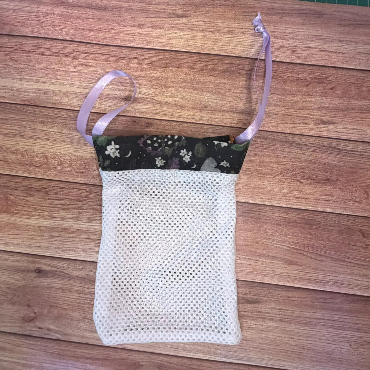 Small protective laundry bag designed for reusable facial cleansing pads.
