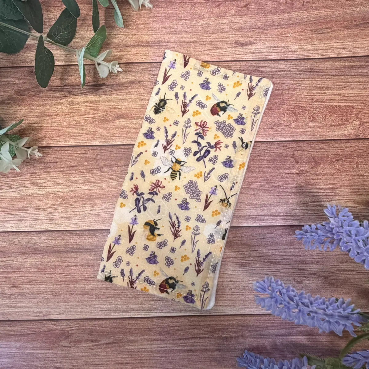 Handmade bee-themed skincare accessory with original insect artwork, a practical choice for beekeeping presents.
