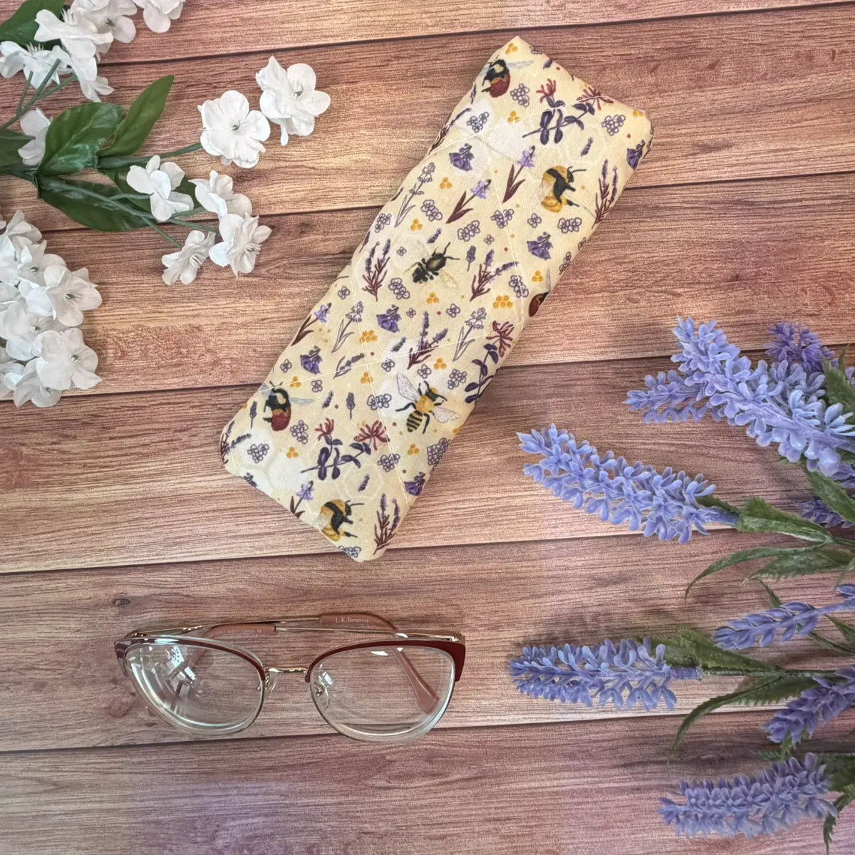 Handmade bee glasses case featuring original Tahlia Paige illustrated bee artwork.
