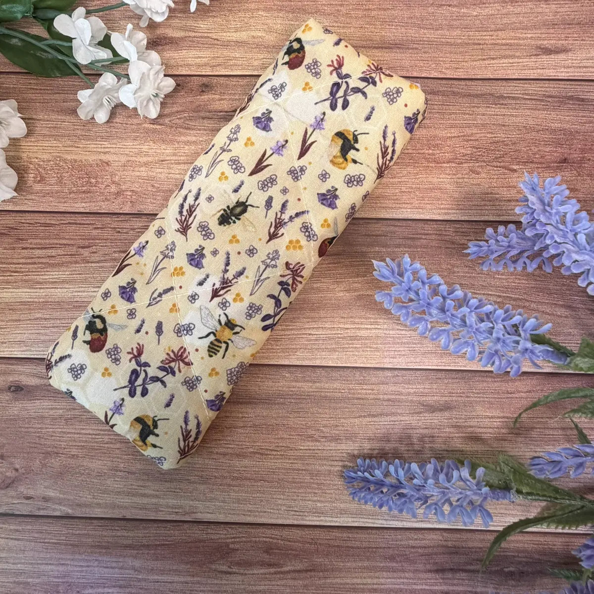 Bumble bee glasses case with original repeating insect illustrations.
