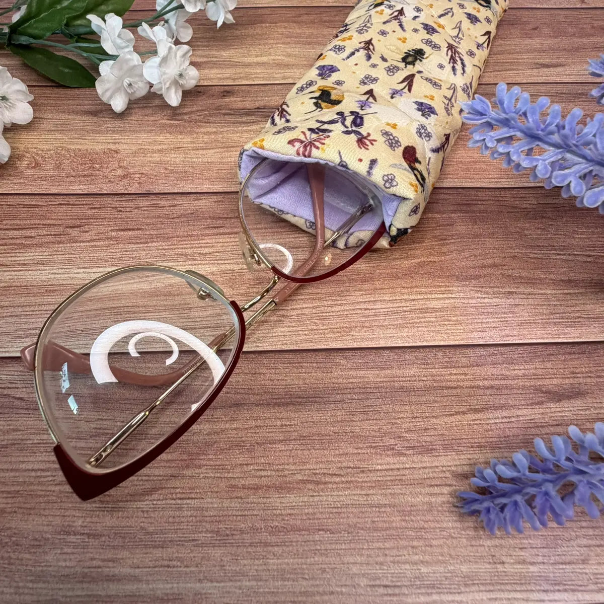 glasses in a bee glasses case