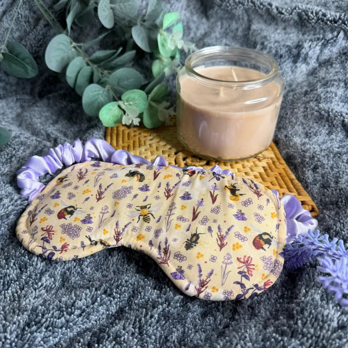 Illustrated bee sleeping mask, a practical present for people looking for gifts for bee lovers.

