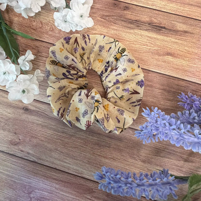 Handmade bee scrunchie featuring original Tahlia Paige bee illustrations.
