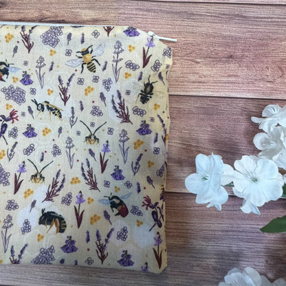 Bumble bee makeup bag with a repeating bee design, handmade by Tahlia Paige.
