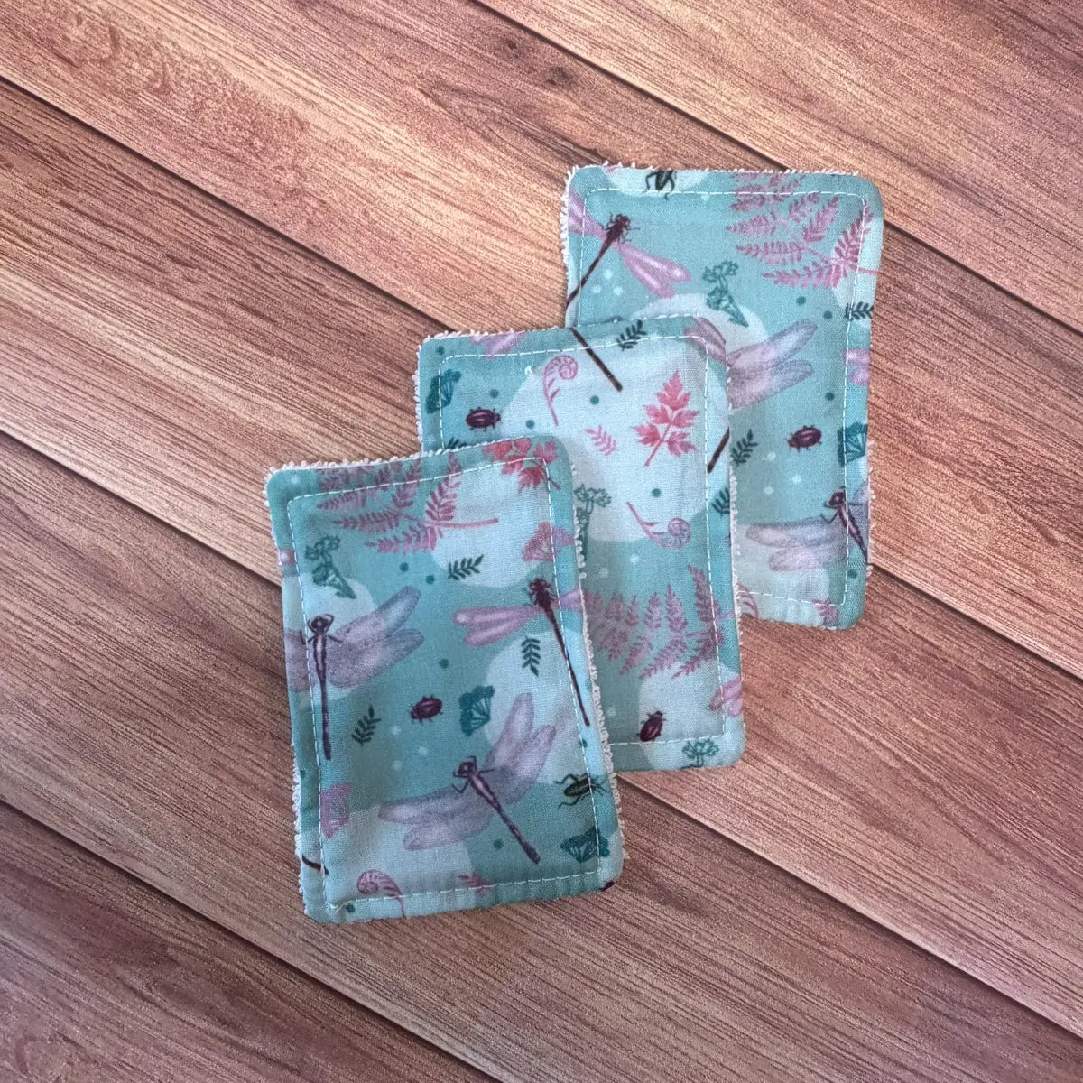 Handmade dragonfly skincare pads designed as an alternative to disposable products.
