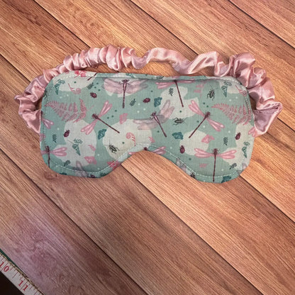Dragonfly eye mask with an elasticated fabric-covered strap for bedtime or travel.
