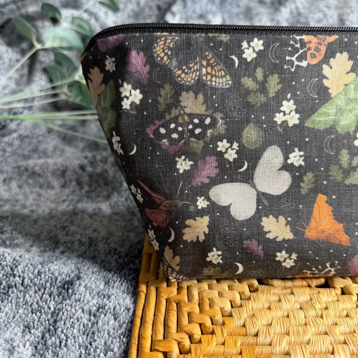 Fabric moth toiletry bag made from soft printed avio cotton.
