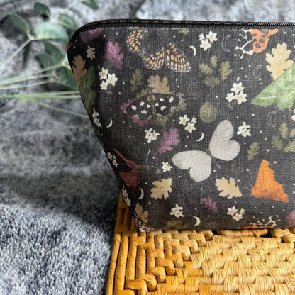 Fabric moth toiletry bag made from soft printed avio cotton.
