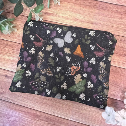 Handmade moth cosmetic pouch featuring original Tahlia Paige illustrated moth artwork.
