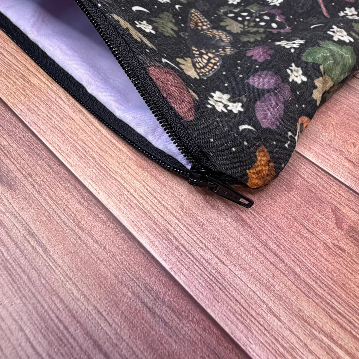 Handmade insect-themed makeup pouch, an unusual choice for anyone searching for butterfly gifts.
