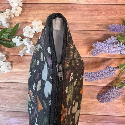 Handmade black moth patterned wash bag for toiletries, cosmetics and travel accessories.
