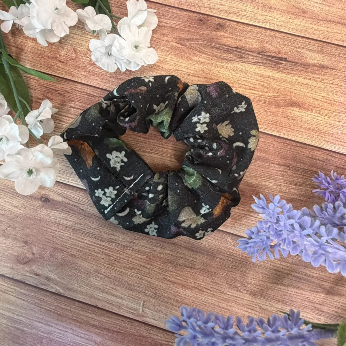 Handmade moth scrunchie featuring original Tahlia Paige moth illustrations.

