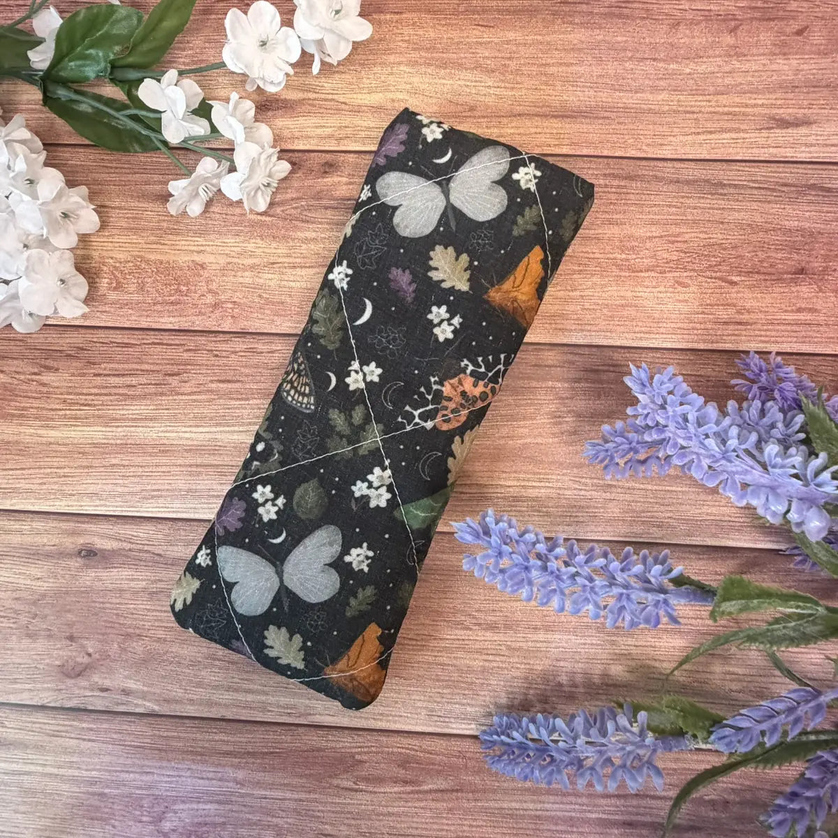 Handmade moth sunglasses case for women featuring original Tahlia Paige insect illustrations.
