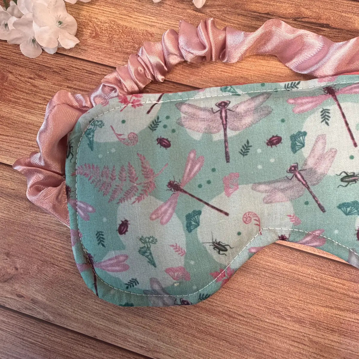 Dragonfly sleeping eye mask made using soft printed avio cotton, polycotton and satin.
