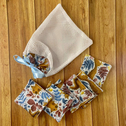 photograph of six reusable skincare pads and matching washbag with the red squirrel pattern on them