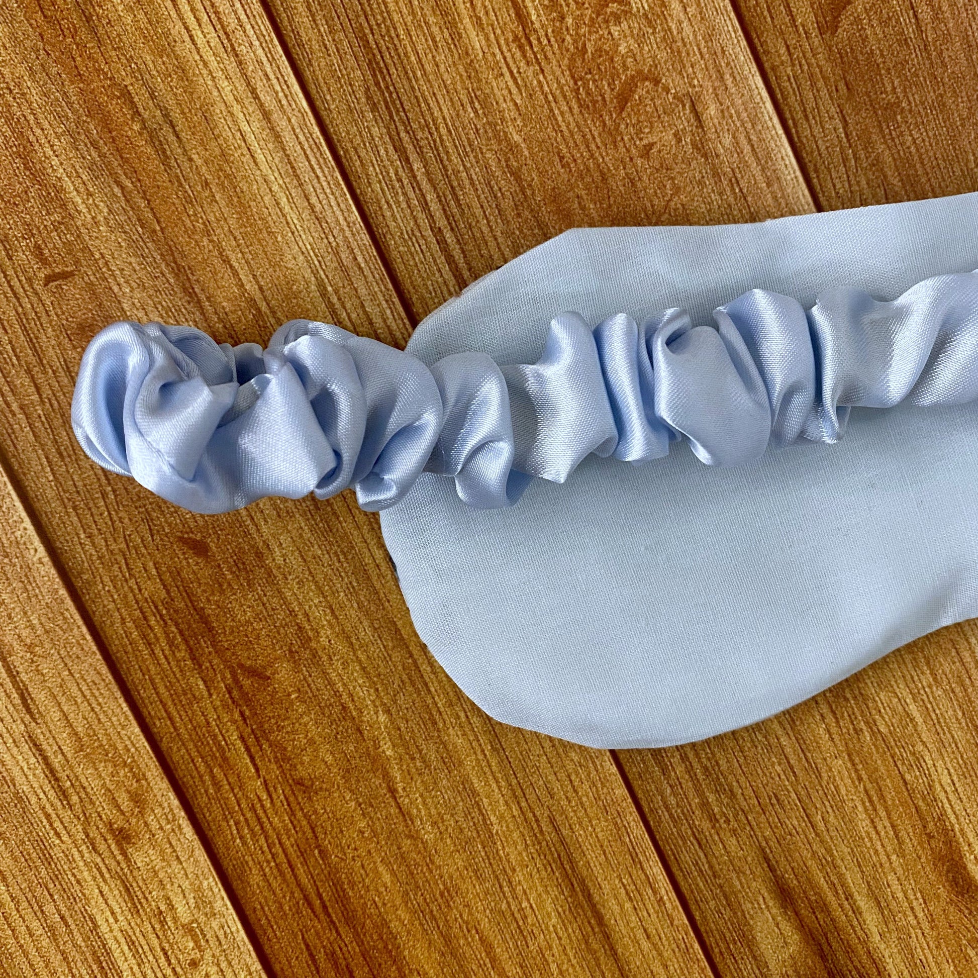 Adorable red squirrel sleep mask, ideal for yoga and as a handmade Welsh gift.