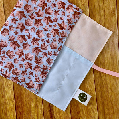 a practical gift for an artist, they can store paintbrushes safely in this brush roll with the inside pockets