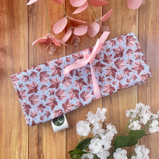 store paintbrushes safely with a roll up storage bag, with a pink nature pattern design, it's ideal for an artist to carry paintbrushes