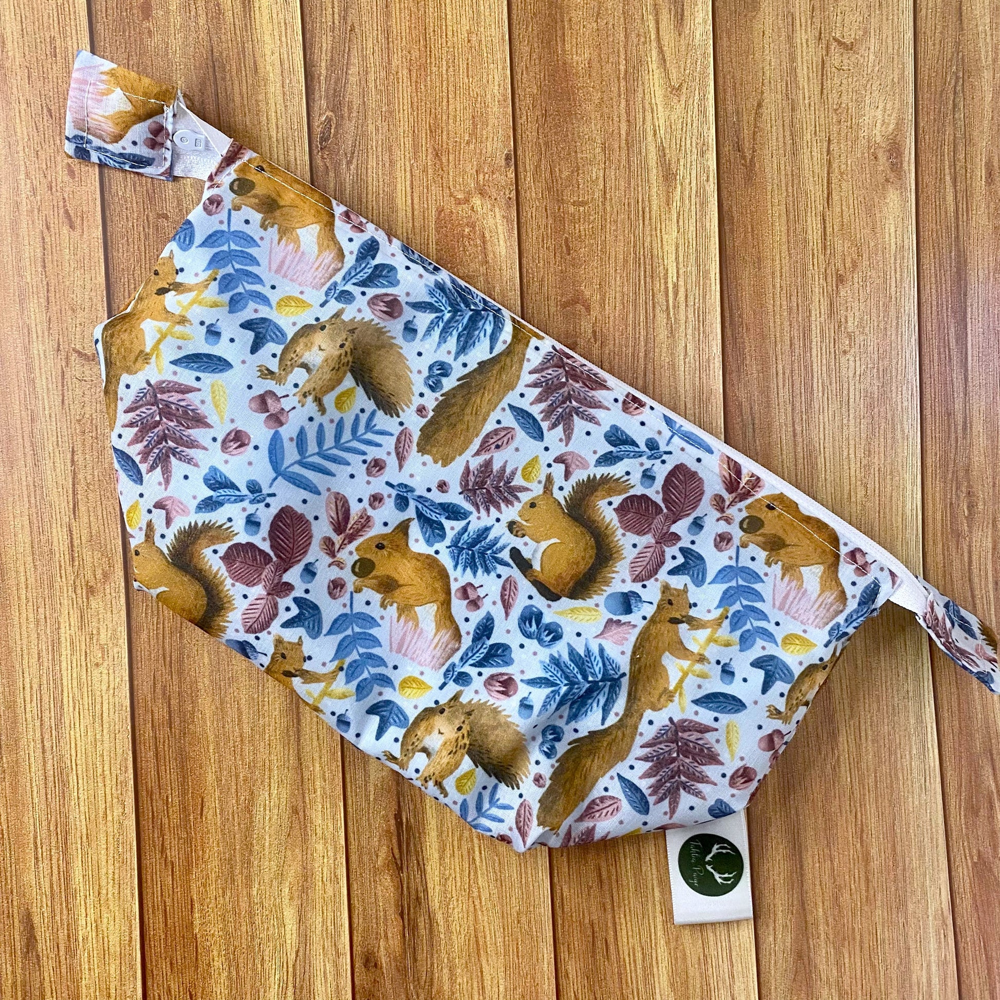 Unique red squirrel makeup bag, ideal for women and perfect as a textiles gift.