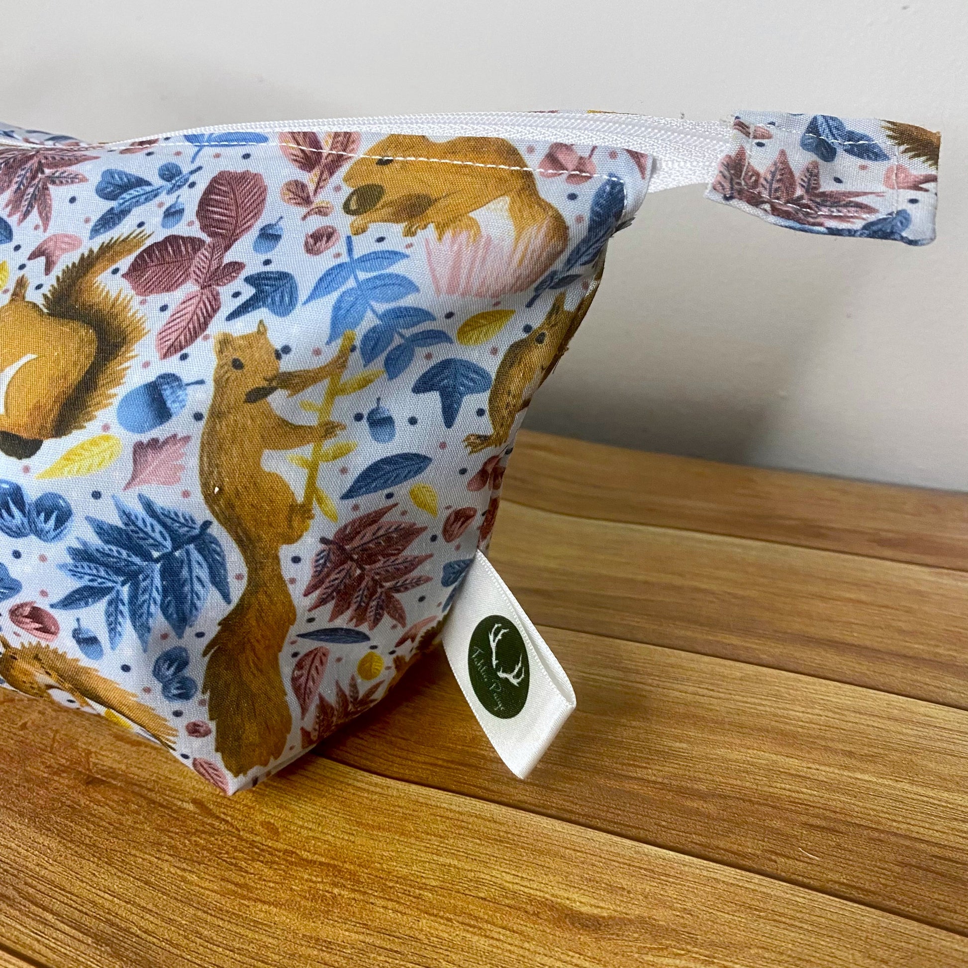 Delightful red squirrel makeup bag for women, perfect for those who appreciate nature lover gifts.