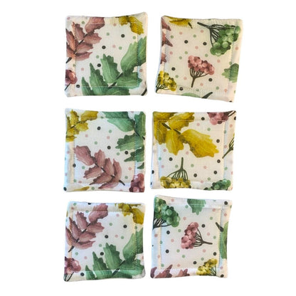 pretty foliage patterned skincare pads on white background