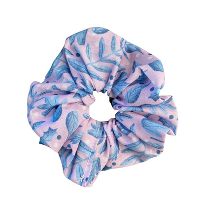 blue foliage pattern on scrunchie on white background