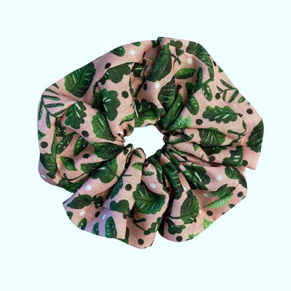Closeup of green foliage scrunchie on a white background