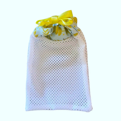 yellow foliage patterned washbag on white background