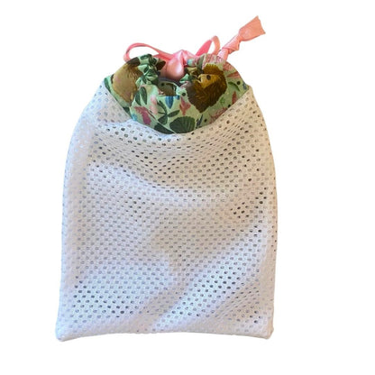 hedgehog patterned washbag with white mesh on a white background 
