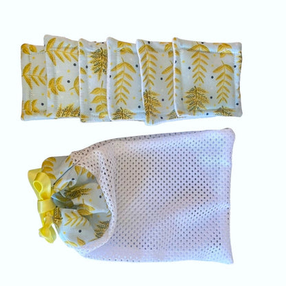 yellow foliage patterned pads and washbag giftset on white background