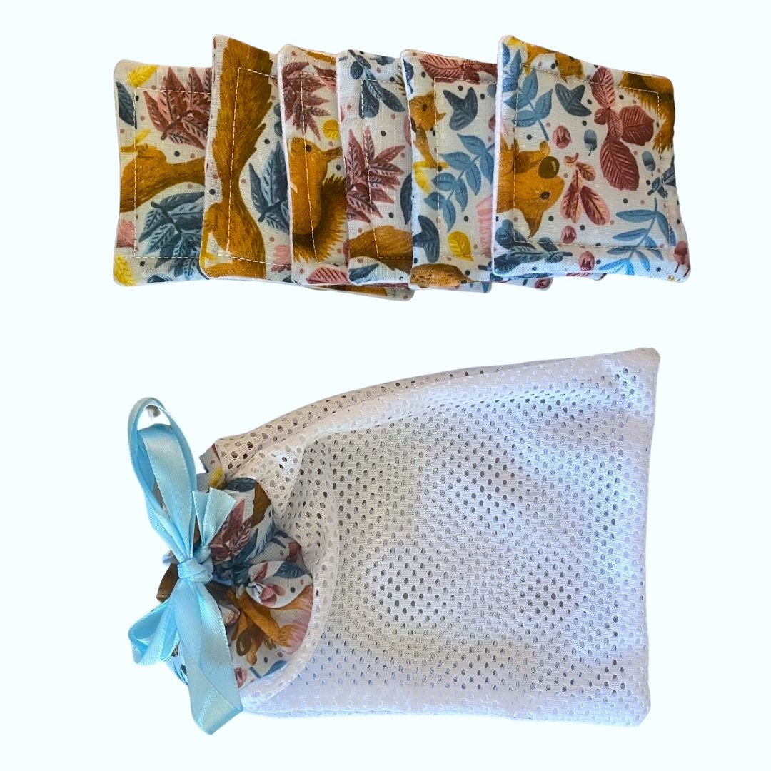 red squirrel patterned washbag and reusable skincare pads giftset on white background
