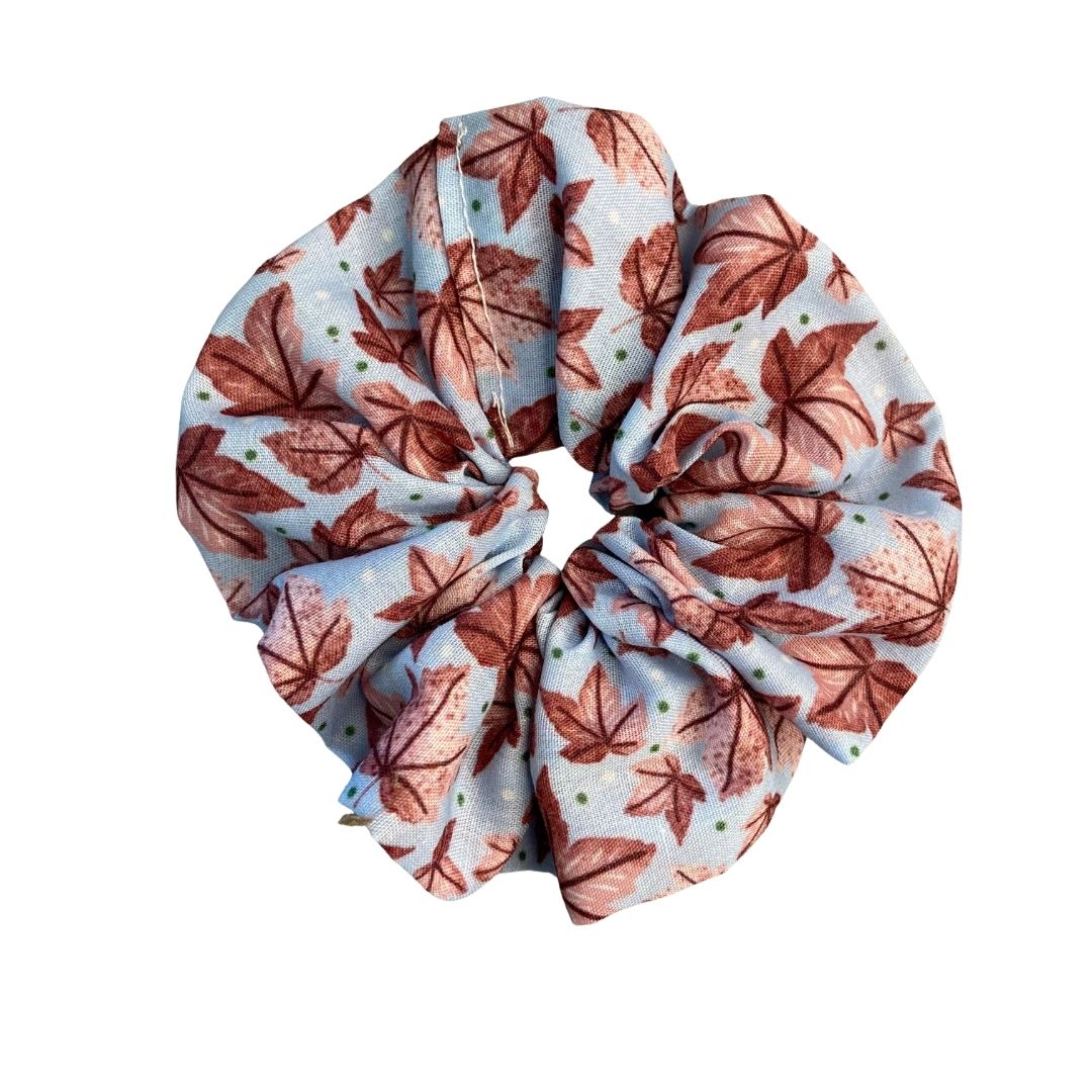 pink leafy patterned scrunchie on white background